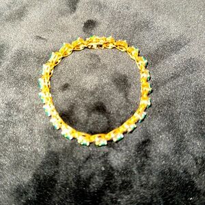 EC GREEN STONE, GOLD COLOR BRACELET.